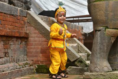 A child dressed as Krishna on the outskirts of Kathmandu. AFP