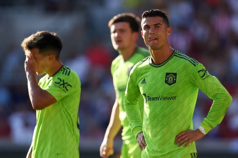 Cristiano Ronaldo and Lisandro Martinez of Manchester United look dejected. Getty