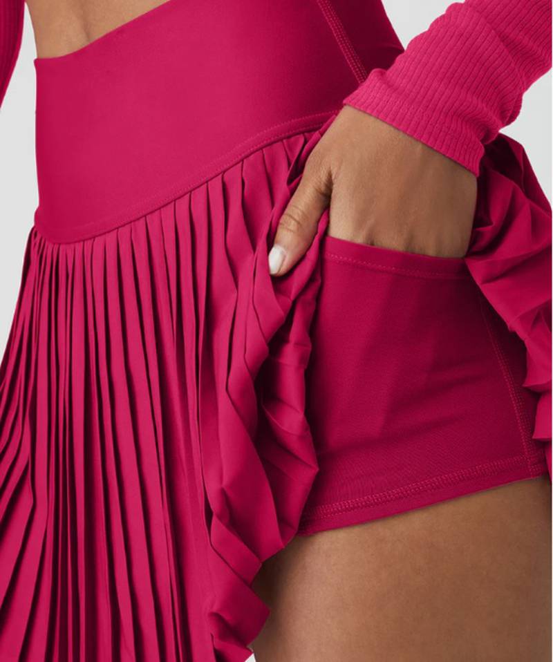 With its built-in shorts and handy pockets, the Grand Slam Tennis Skirt by Alo Yoga is a winner on and off the court. Dh325, www.aloyoga.com. Photo: Alo Yoga