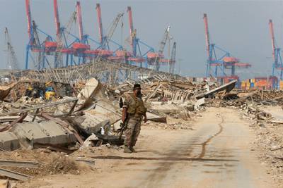 Lebanese army member stands at the site of Tuesday's blast, at Beirut's port area, Lebanon. Reuters