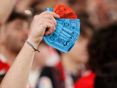 Athletic's fans throw fake money with the Barcelona's logo to protest against the 'Negreira Case' during the Spanish LaLiga soccer match between Athletic Club and FC Barcelona in Bilbao, Basque Country, Spain, 12 March 2023.  Spanish authorities are investigating a company owned by former CTA vice president Jose Maria Enriquez Negreira for receiving payments worth around 7. 3 million euro from FC Barcelona between 2001 and 2018.   EPA / Luis Tejido