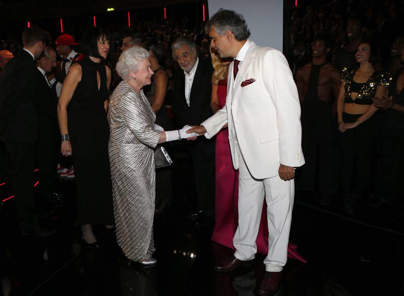 Queen Elizabeth greets Italian operatic tenor Andrea Bocelli at the Royal Variety Performance in 2012. Getty Images