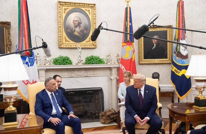 US President Donald Trump(R) meets with Iraqi Prime Minister Mustafa al-Kadhemi  in the Oval Office of the White House in Washington, DC, August 20, 2020. AFP