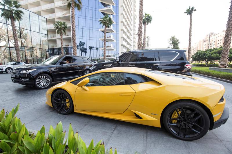 DUBAI, UNITED ARAB EMIRATES, 07 August 2018 - A Lamborghini car involve in a 170,000 speeding fine parked at Five Hotel, Palm Jumeirah, Dubai.  Leslie Pableo for The National 