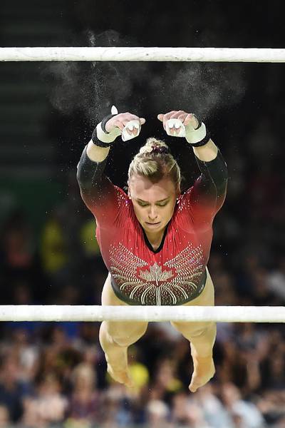 Canada's Elsabeth Black competes on the uneven bars during the women's team final and individual qualification in the artistic gymnastics event during the 2018 Gold Coast Commonwealth Games. Ye Aung Thu / AFP Photo