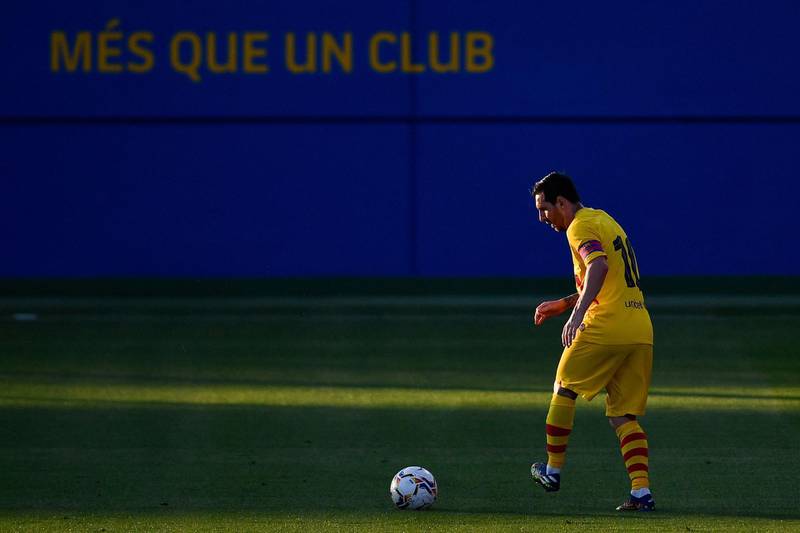Lionel Messi controls the ball during a friendly match between Barcelona and Gimnastic at the Johan Cruyff stadium. AFP