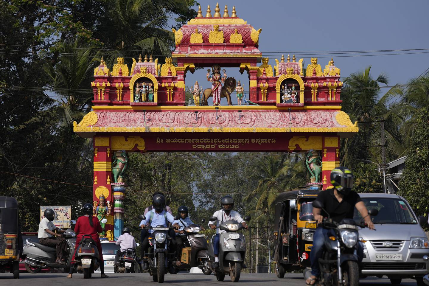 An arch decorated with Hindu deities, leading to a temple in Udupi district, Karnataka state, India. AP
