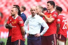 Manchester United manager Erik ten Hag with his players after the FA Cup final defeat against Manchester City. Reuters