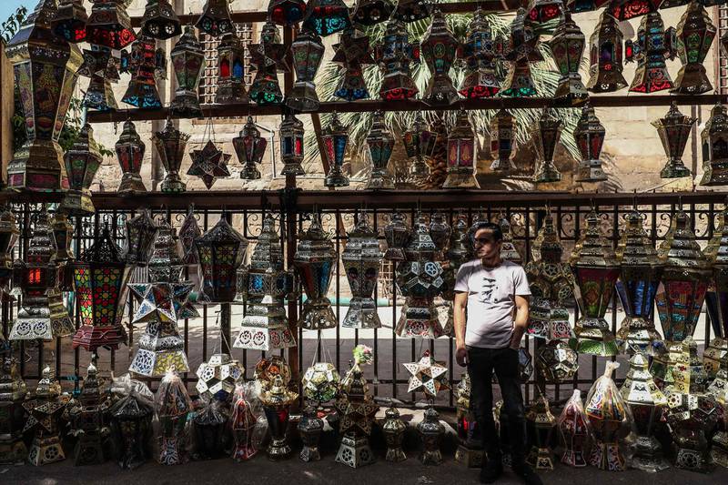 An Egyptian vendor sells traditional lanterns known in Arabic as "Fanous" ahead of the Muslim holy month of Ramadan in the capital Cairo.  AFP