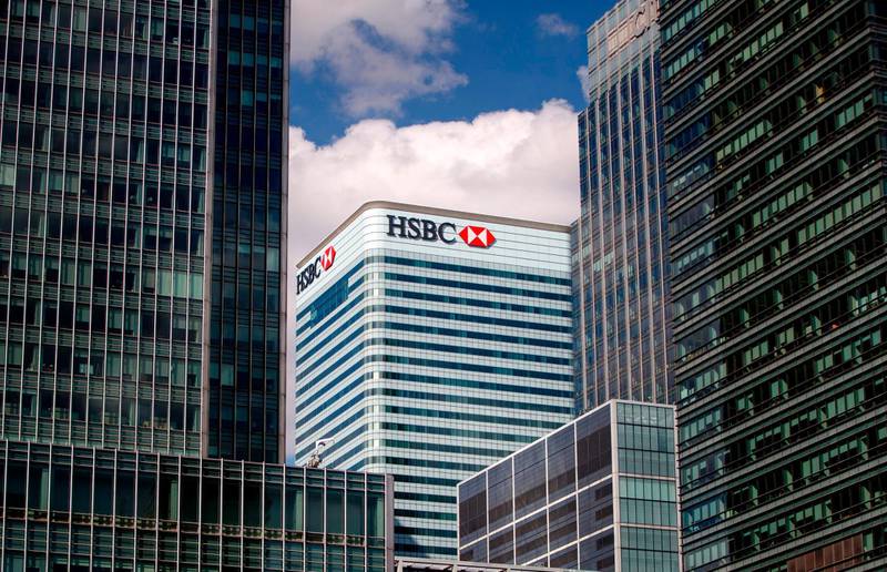 (FILES) In this file photo taken on July 31, 2018, the HSBC UK headquarters is seen at the Canary Wharf financial district of London on July 31, 2018. HSBC has agreed to pay $765 million to resolve allegations it passed on toxic mortgage securities to investors prior to the global financial crisis, federal prosecutors announced October 9, 2018. Between 2005 and 2007, HSBC staff knowingly packaged low-grade loan pools with high rates of default into mortgage-backed securities, despite warnings from its internal risk management team and outside reviewers, according to the US Attorney's Office in Colorado. / AFP / Tolga Akmen
