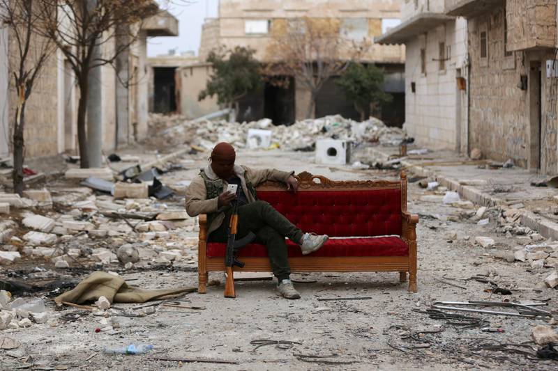 A Turkey-backed Free Syrian Army fighter is seen in the eastern suburbs of al Bab, Syria. Khalil Ashawi / Reuters