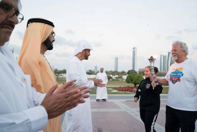 ABU DHABI, UNITED ARAB EMIRATES - March 10, 2019: HH Sheikh Mohamed bin Zayed Al Nahyan, Crown Prince of Abu Dhabi and Deputy Supreme Commander of the UAE Armed Forces (3rd L), HH Sheikh Mohamed bin Rashid Al Maktoum, Vice-President, Prime Minister of the UAE, Ruler of Dubai and Minister of Defence (2nd L) and HH Sheikh Maktoum bin Mohamed bin Rashid Al Maktoum, Deputy Ruler of Dubai (L), applaud participants in the Special Olympics World Games 2019 Law Enforcement Torch Run, at the Presidential Palace.


( Mohamed Al Hammadi / Ministry of Presidential Affairs )
---