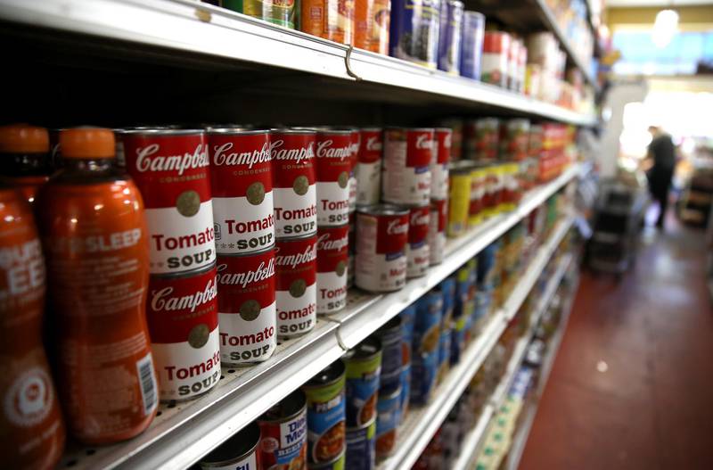 RICHMOND, CALIFORNIA - JUNE 05: Can of Campbell's soup are displayed on a shelf at a grocery store on June 05, 2019 in Richmond, California. Campbell Soup Co. reported better-than-expected third quarter earnings with sales of $2.388 billion compared to analyst expectations of $2.36 billion.   Justin Sullivan/Getty Images/AFP