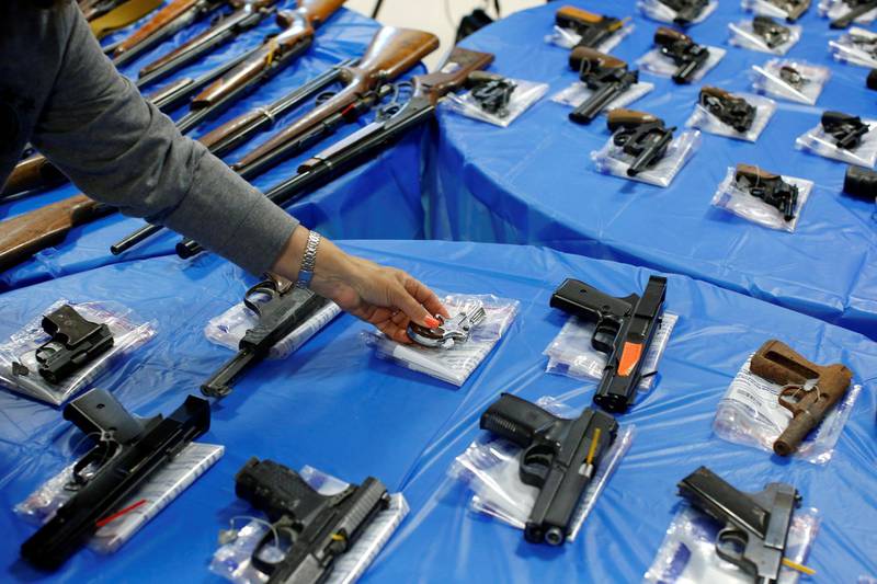 Guns are displayed after a gun buyback event organized by the New York City Police Department (NYPD), in the Queens borough of New York City, U.S. Reuters