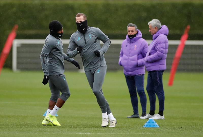 Tottenham Hotspur's Harry Kane, Danny Rose, manager Jose Mourinho and tactical analyst Ricardo Formosinho during training. Reuters