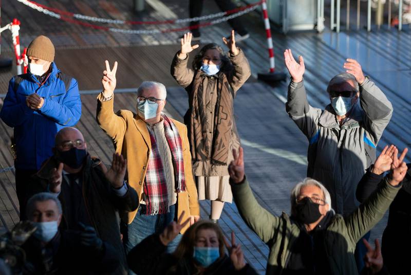 People demonstrate at the courthouse in Antwerp, Belgium. AP Photo