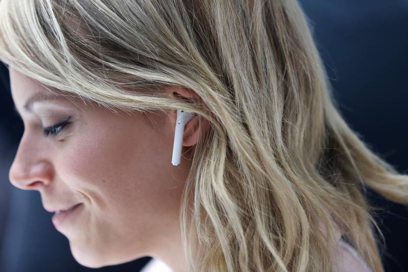 SAN FRANCISCO, CA - SEPTEMBER 07: An attendee wears an Apple AirPods during a launch event on September 7, 2016 in San Francisco, California. Apple Inc. unveiled the latest iterations of its smart phone, the iPhone 7 and 7 Plus, the Apple Watch Series 2, as well as AirPods, the tech giant's first wireless headphones.   Stephen Lam/Getty Images/AFP