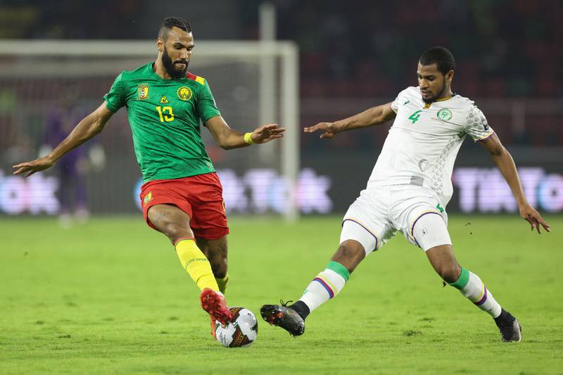 Comoros defender Younn Zahary fights for the ball with Cameroon forward Eric Choupo Moting. AFP