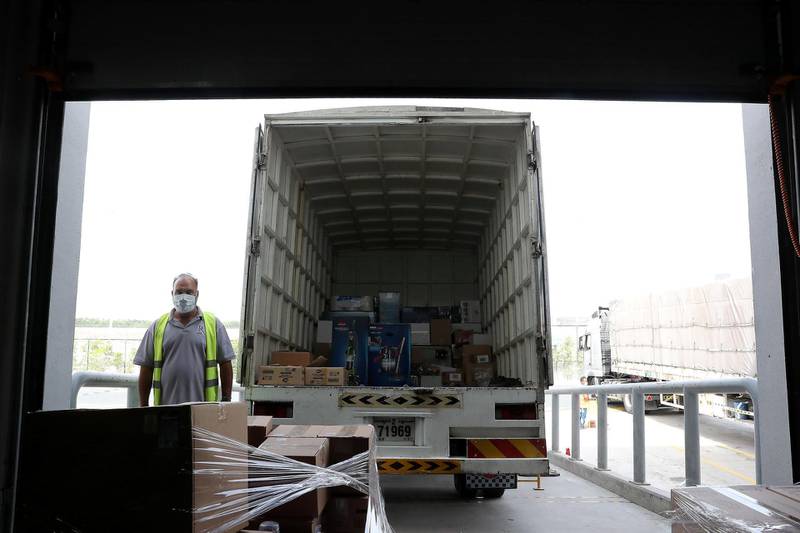 DUBAI, UNITED ARAB EMIRATES , March 18, 2021 –  View of the unloading area at the Amazon DXB3,  Amazon fulfilment centre  in Dubai Logistics City in Dubai. (Pawan Singh / The National) For Lifestyle/Online/Instagram. Story by Farah