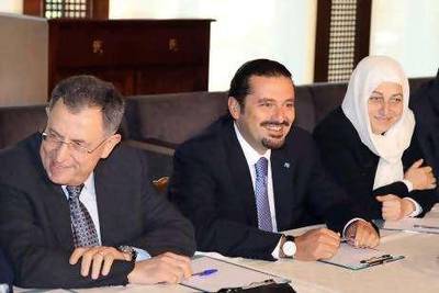 A handout picture released by Dalati & Nohra show Lebanese Prime Minister Saad al-Hariri (C ), heading a meeting to "the future” parliamentary block with former Prime Minister Fouad Siniora (L) and his aunt MP Bahia Hariri (R ) in his home, in Beirut, 20 September 2010, which offer "to the overall political developments in the country." The PM returned from Saudi Arabia earlier on Monday and reportedly plans to attend Tuesday’s cabinet session.  EPA/DALATI & NOHRA / HO  EDITORIAL USE ONLY