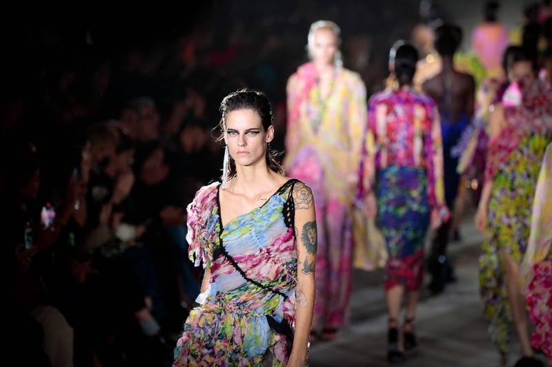 In a show that built from all black to a riot of colour, the Dries Van Noten show was brimming with optimism for spring/summer 2023. AFP