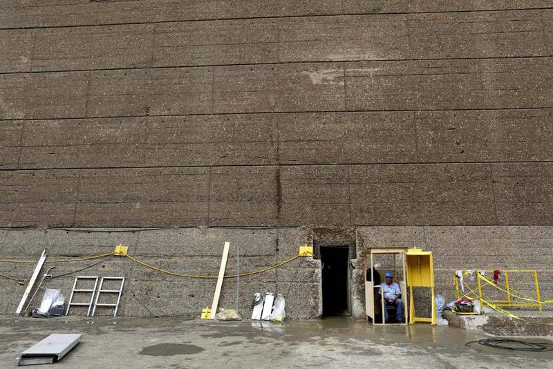 A Panama Canal employee takes a break in a dry chamber of the Miraflores locks during its periodical maintenance. Carlos Jasso / Reuters