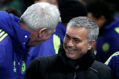Chelsea manager Jose Mourinho talks with a member of staff during his side's Champions League victory against Sporting Lisbon on Wednesday. Clive Mason / Getty Images / December 10, 2014
