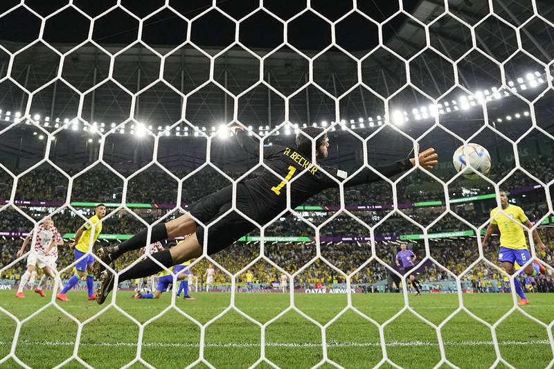 Brazil goalkeeper Alisson becker is beaten by Bruno Petkovic's goal for Croatia. AP