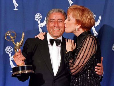 Tony Bennett and comedienne Carol Burnett after he won an Emmy Award in September 1996. Reuters