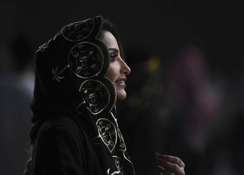A woman enjoys the Saudi Cup. AP