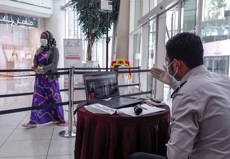 Abu Dhabi, United Arab Emirates, May 10, 2020.   The reopening of the Al Wahda Mall during the Coronavirus pandemic.  Thermal scanners at the mall entrance.Victor Besa/The NationalSection:  NAReporter:
