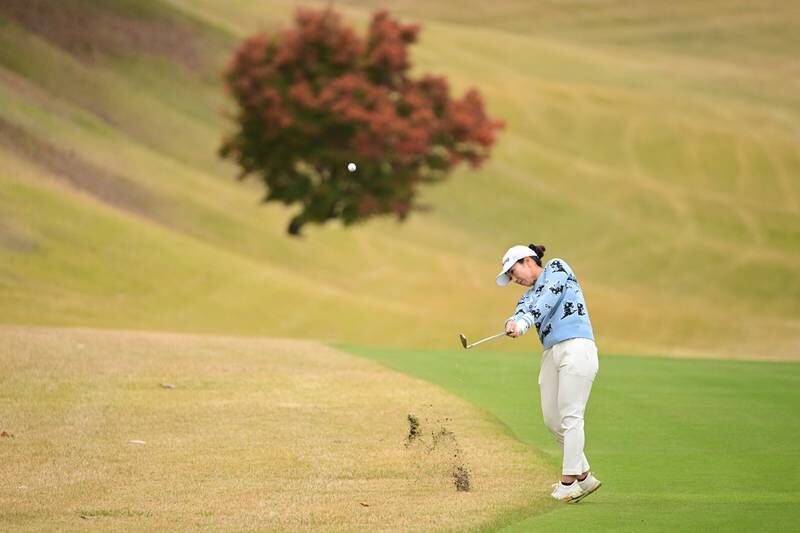 Ritsuko Ryu of Japan hits her third shot on the 11th hole during the first round of Daio Paper Elleair Ladies at Elleair Golf Club Matsuyama in Matsuyama, Ehime, Japan. Getty
