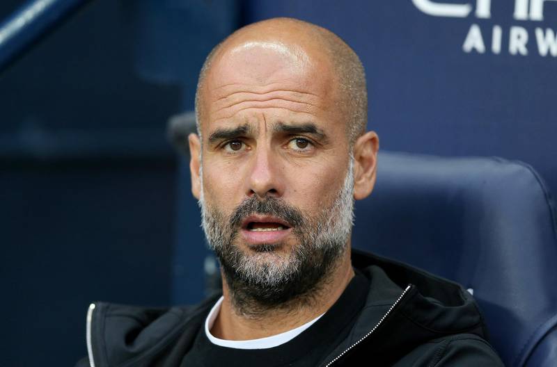 epa06723551 Manchester City's manager Pep Guardiola reacts during the English Premier League soccer match between Manchester City and Brighton at the Etihad Stadium in Manchester, Britain, 09 May 2018.  EPA/NIGEL RODDIS EDITORIAL USE ONLY. No use with unauthorised audio, video, data, fixture lists, club/league logos 'live' services. Online in-match use limited to 75 images, no video emulation. No use in betting, games or single club/league/player publications.