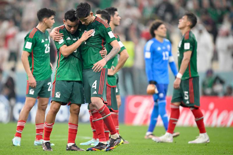 Mexico's Carlos Rodriguez, left, and Edson Alvarez, right. The Mexicans beat Saudi Arabia but were knocked out. AFP