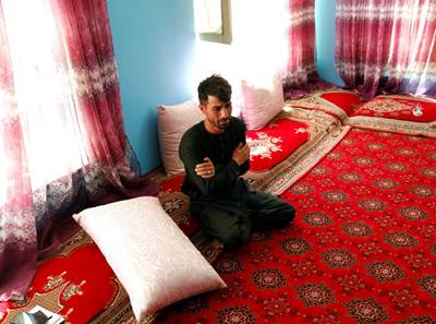 Mirwais Elmi 26, an Afghan groom who survived a suicide attack at his wedding reception on Saturday night, reacts during an interview at his house in Kabul, Afghanistan August 19, 2019.REUTERS/Mohammad Ismail
