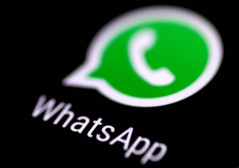 FILE PHOTO: The WhatsApp messaging application is seen on a phone screen August 3, 2017. REUTERS/Thomas White/File Photo