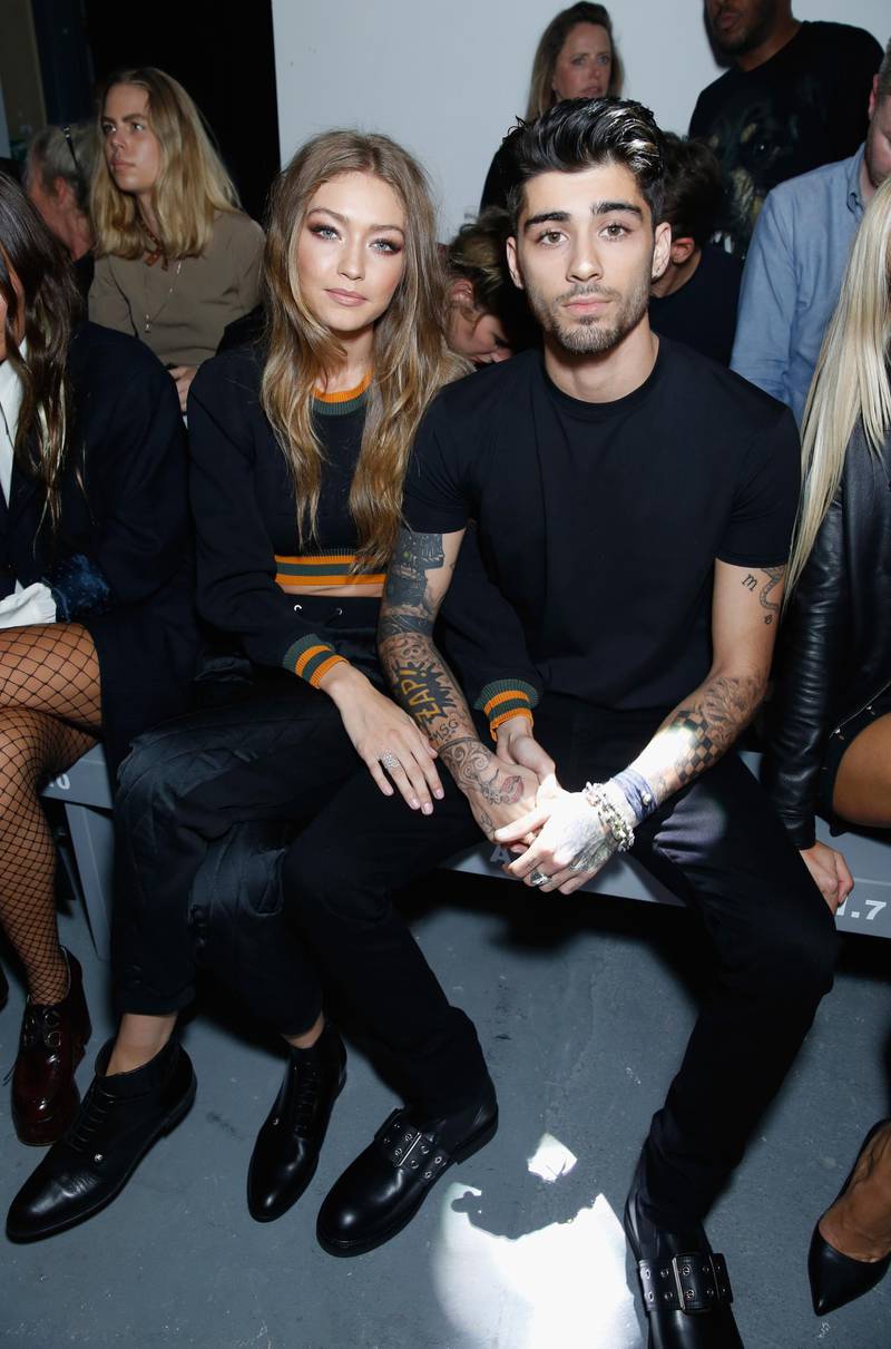 LONDON, ENGLAND - SEPTEMBER 17:  Gigi Hadid and Zayn Malik attend the Versus Versace show during London Fashion Week Spring/Summer collections 2016/2017 on September 17, 2016 in London, United Kingdom.  (Photo by Darren Gerrish/WireImage)