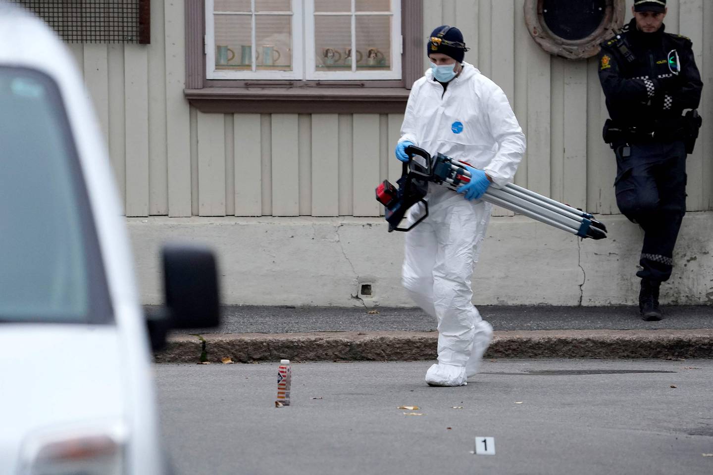 A member of the police forensics team at the scene in Kongsberg. AFP