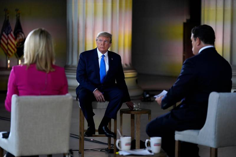 President Donald Trump looks on during a Fox News virtual town hall from the Lincoln Memorial, in Washington, co-moderated by FOX News anchors Bret Baier and Martha MacCallum. AP Photo