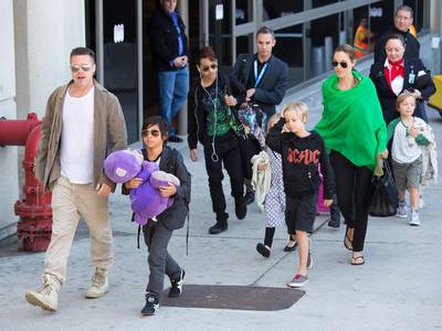 Brad Pitt and Angelina Jolie with five of their six children, from left, Pax, Maddox, Vivienne, Shiloh and Knox in Los Angeles in February last year.  GVK / Bauer-Griffin / GC Images