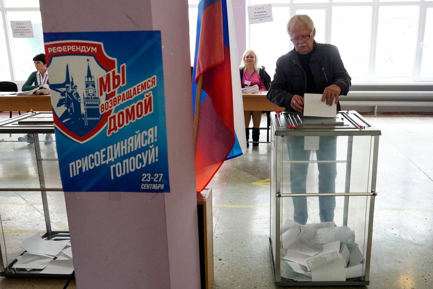 A man casts his ballot for a referendum at a polling station in Mariupol. AFP