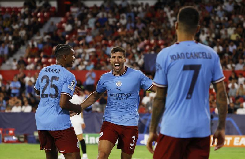 City's Ruben Dias celebrates scoring their fourth goal with Manuel Akanji. Reuters