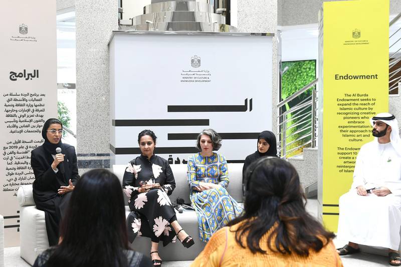 From left: Noura Al Kaabi, Minister of Culture and Knowledge Development (MCKD), artists Aisha Khalid, Fatima Uzdenova and Aljoud Lootah, and Sheikh Salem Al Qasimi, Assistant Under Secretary of Heritage and Arts at MCKD. Courtesy MCKD