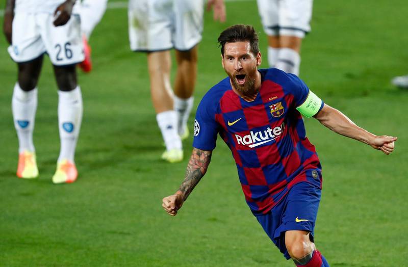 Barcelona's Lionel Messi celebrates after scoring the second goal against Napoli at the Camp Nou. AP