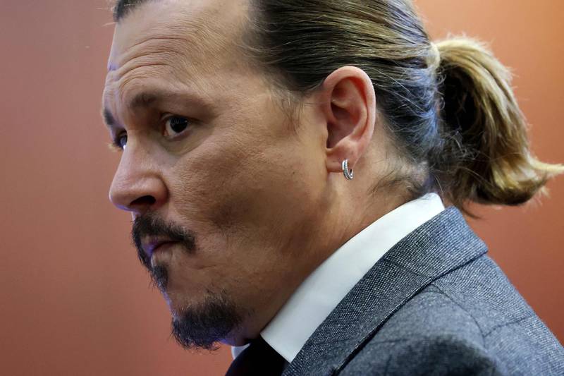 Depp watches the jury return. AFP