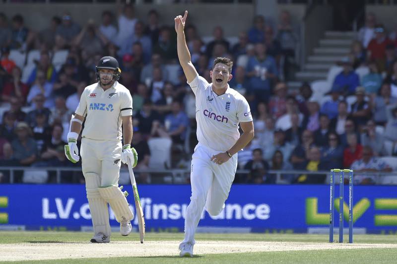 England bowler Matthew Potts celebrates after dismissing New Zealand's Will Young for eight. AP
