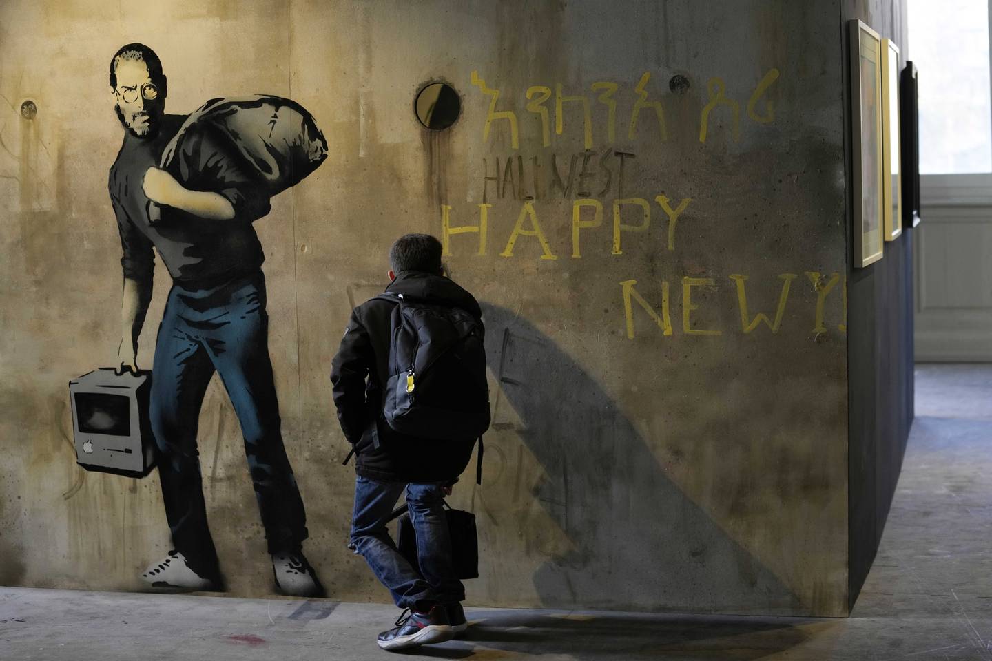 A reproduction of a mural of Steve Jobs by British artist Banksy in Milan last year. AP Photo