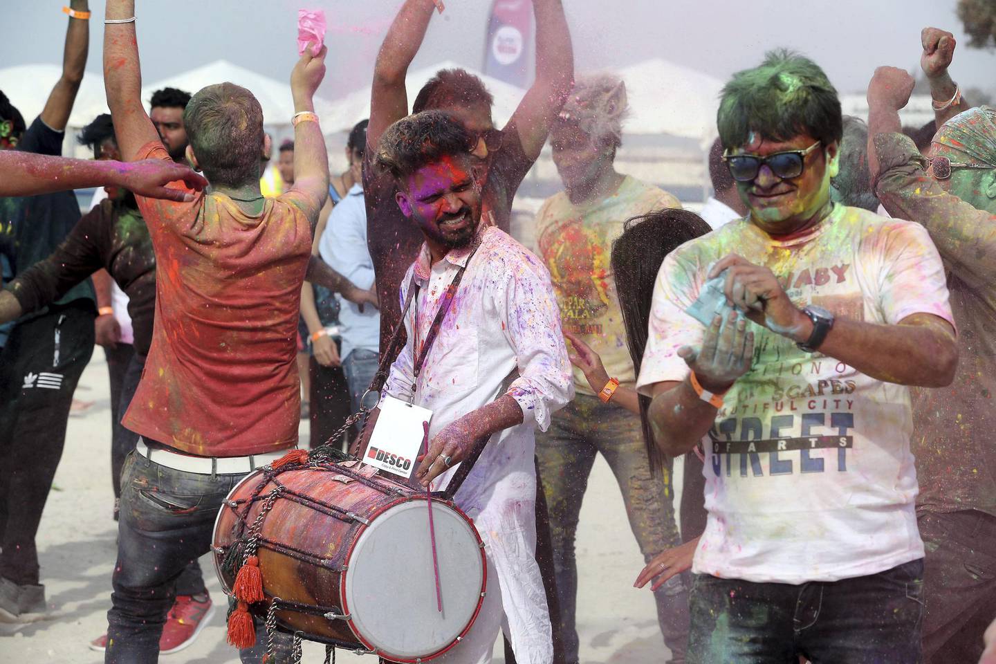 DUBAI , UNITED ARAB EMIRATES , March 13 – 2020 :- People celebrating Holi festival during the Clorox Holi Beach Party held at JA Beach hotel in Dubai. Holi is a popular ancient Indian festival. Some guests from UK also celebrated Holi at the Holi Beach Party. (Pawan Singh / The National ) For Weekend Photo Project