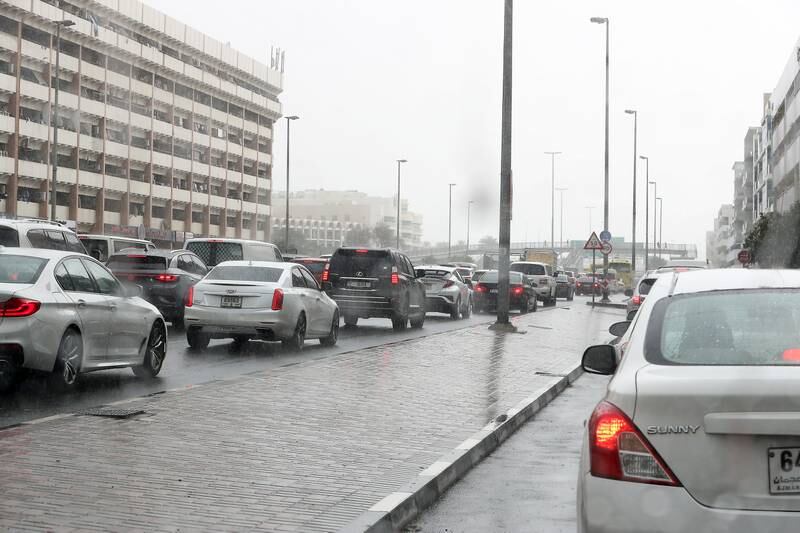 Traffic builds up amid wet weather in Al Karama. Pawan Singh / The National