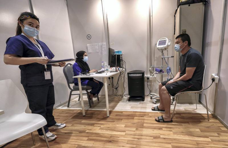 Abu Dhabi, United Arab Emirates, August 6, 2020.  A vaccine volunteer gets a medical check up at the ADNEC volunteer facility. Victor Besa /The NationalSection: NAReporter:  Shireena Al Nowais